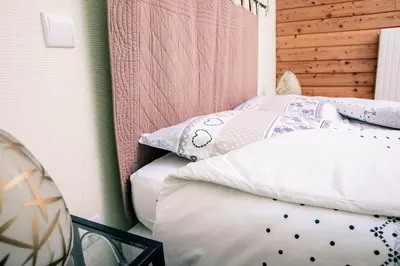 Un ou plusieurs lits dans un hébergement de l'établissement Hôtel Restaurant Domaine De Basil