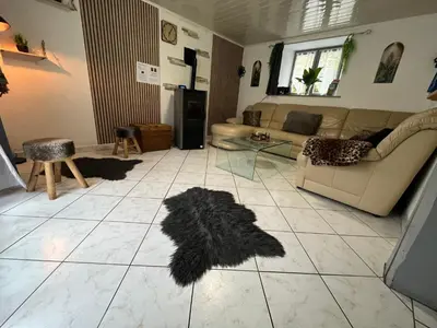 Coin salon dans l'établissement Maison Dans les nuages