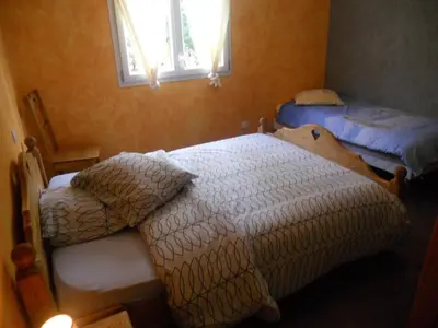 Un ou plusieurs lits dans un hébergement de l'établissement Auberge du Saut des Cuves