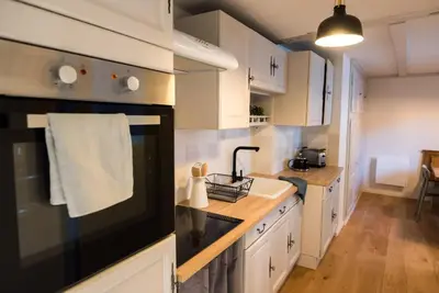 Cuisine ou kitchenette dans l'établissement Le cocon de Jules