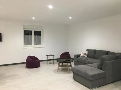 Coin salon dans l'établissement appart Renard 4 étoiles