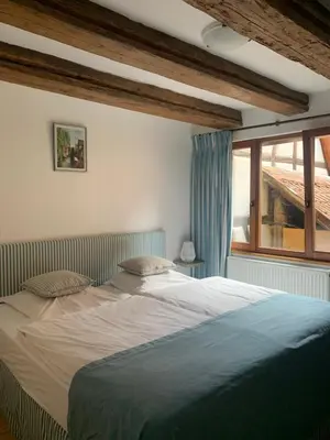 Un ou plusieurs lits dans un hébergement de l'établissement Gite - Chez Joséphine