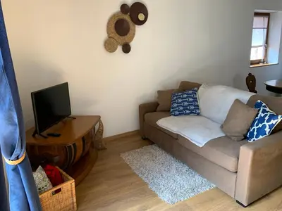 Télévision ou salle de divertissement dans l'établissement Gite - Chez Joséphine
