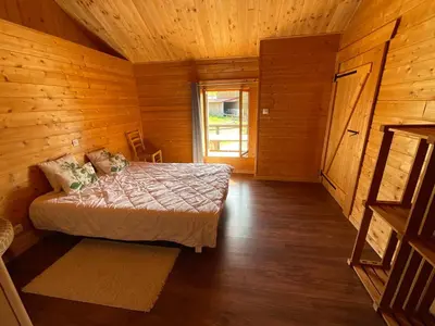 Un ou plusieurs lits dans un hébergement de l'établissement Annexe de ferme cosy à 15 min de Gérardmer,Ventron et La Bresse