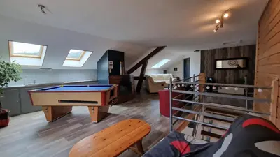 Coin salon dans l'établissement Gitedaval Hangy Haut & spa