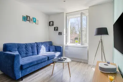 Coin salon dans l'établissement Le 001-GregIMMO-Appart'Hôtel