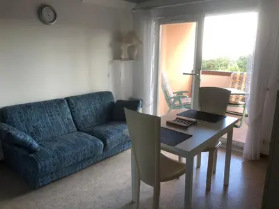 Coin salon dans l'établissement Trois-Épis, vue magnifique