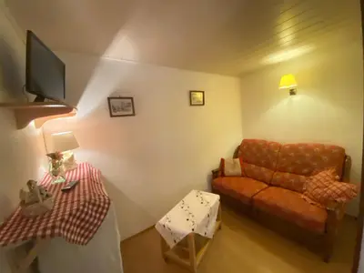 Coin salon dans l'établissement Gite Lammer