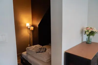 Un ou plusieurs lits dans un hébergement de l'établissement Le petit boulanger, grand 70 m2, garage disponible