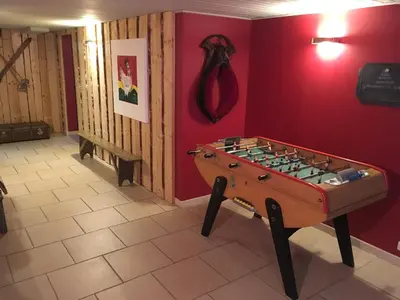 Salle de jeux dans l'établissement La Ferme du Douanier & Spa 5 étoiles ALL INCLUSIVE