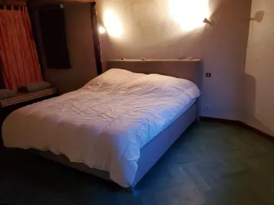 Un ou plusieurs lits dans un hébergement de l'établissement charmant appartement alsacien