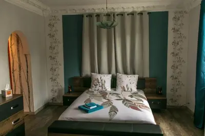 Un ou plusieurs lits dans un hébergement de l'établissement auberge du tempo