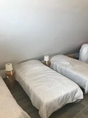 Un ou plusieurs lits dans un hébergement de l'établissement Auberge du Parc