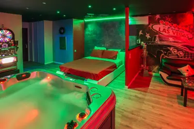 Un ou plusieurs lits dans un hébergement de l'établissement American spa motel