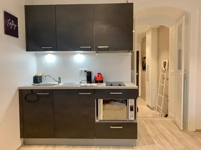 Cuisine ou kitchenette dans l'établissement Le coin 45