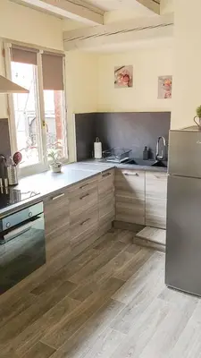 Cuisine ou kitchenette dans l'établissement Le Familial