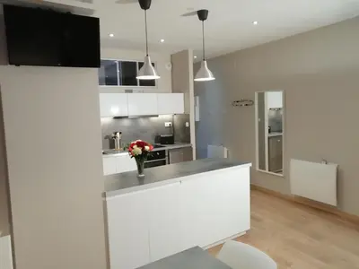 Cuisine ou kitchenette dans l'établissement Côté Cour