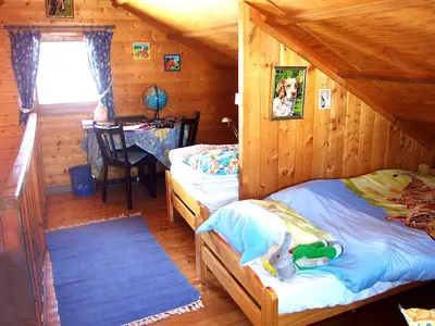 Un ou plusieurs lits dans un hébergement de l'établissement Chalet Gerbepal by Interhome