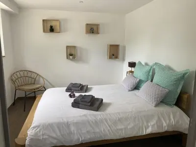 Un ou plusieurs lits dans un hébergement de l'établissement Le Clos des Pommiers Fuji