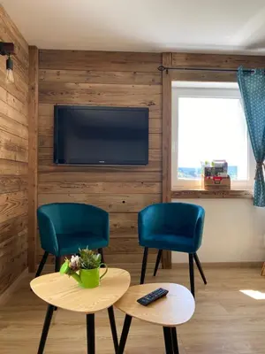 Télévision ou salle de divertissement dans l'établissement Le cocon d’Emma