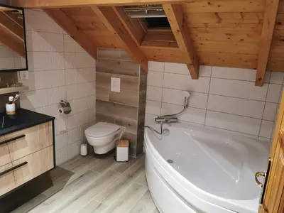 Salle de bains dans l'établissement Nouveau Chalet M.META 12 pers sauna,jacuzzi,billard