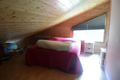 Un ou plusieurs lits dans un hébergement de l'établissement Chalet le Bruleux