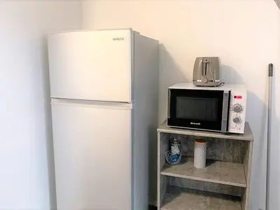 Cuisine ou kitchenette dans l'établissement MyHome Basel 3B44
