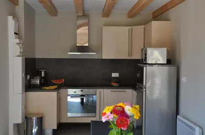 Cuisine ou kitchenette dans l'établissement Le Chalet La Cigogne et Le Chamois