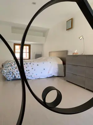 Un ou plusieurs lits dans un hébergement de l'établissement Guesthouse Les 3 Chateaux