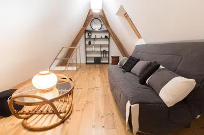 Coin salon dans l'établissement Au Cocon des Cigognes