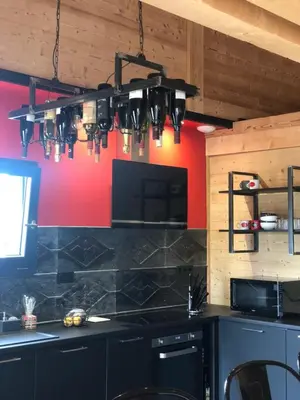 Cuisine ou kitchenette dans l'établissement L'ADRET DU TEMPS CHALET 10 PERSONNES 170m2