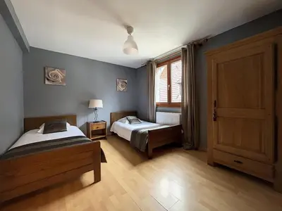 Un ou plusieurs lits dans un hébergement de l'établissement Appartement 2 chambres au cœur du vignoble avec terrasse