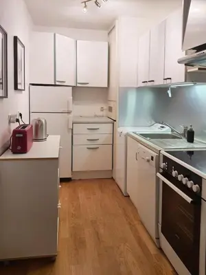 Cuisine ou kitchenette dans l'établissement Happy family's nest