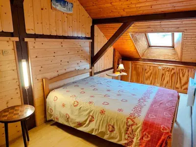 Un ou plusieurs lits dans un hébergement de l'établissement Gîte confortable à La Bresse, proche centre-ville, nature et activités - FR-1-589-97