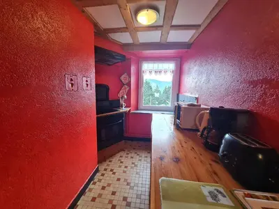 Télévision ou salle de divertissement dans l'établissement Gîte chaleureux avec terrasse privée à Gérardmer - FR-1-589-159