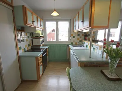 Cuisine ou kitchenette dans l'établissement Gîte chaleureux à La Bresse avec terrasse, barbecue et proche des pistes de ski - FR-1-589-189
