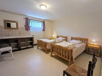 Un ou plusieurs lits dans un hébergement de l'établissement Gîte convivial à Xonrupt-Longemer, près du lac et des activités sportives, avec wifi et terrasse - FR-1-589-204