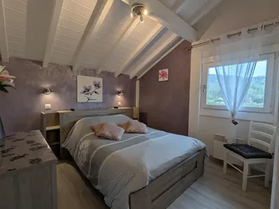 Un ou plusieurs lits dans un hébergement de l'établissement Évasion Vosgienne: Chalet de Luxe, Spa, Sauna, Proche Randos et Stations de Ski - FR-1-589-313