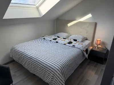 Un ou plusieurs lits dans un hébergement de l'établissement Appartement Bes,, Attique neuf avec confort