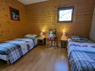 Un ou plusieurs lits dans un hébergement de l'établissement Chalet rénové proche du Valtin – Idéal pour famille, randonnées et ski, Wifi, luges fournies - FR-1-589-150