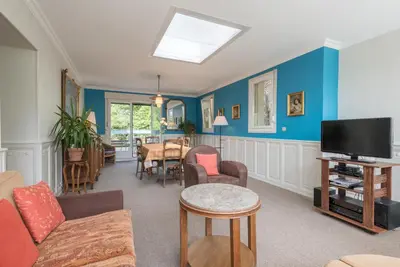 Télévision ou salle de divertissement dans l'établissement Appartements Maison Bellevue
