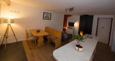 Coin salon dans l'établissement Le Cocon du Village Gérardmer