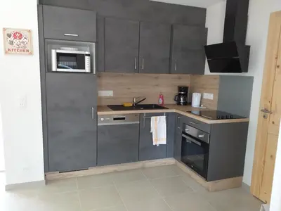 Cuisine ou kitchenette dans l'établissement Les balcons la haie des grisselles