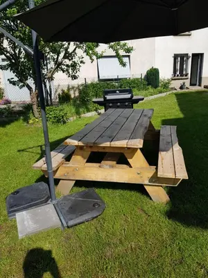 Jardin de l'établissement Joli petit studio les brimbelles
