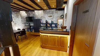 Salon ou bar de l'établissement Maison Le Clos Bartholdi