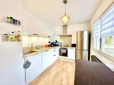 Cuisine ou kitchenette dans l'établissement Centre Ville - Balcon - Parking gratuit