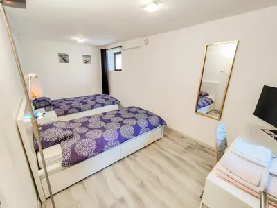 Un ou plusieurs lits dans un hébergement de l'établissement Quiet Studio - Personal Welcome - Near Basel