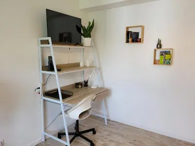 Télévision ou salle de divertissement dans l'établissement Le Guèlèf - Appartement 2 personnes