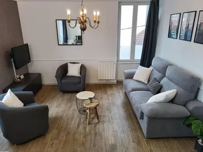 Coin salon dans l'établissement Le 1A, Charmant Appartement au Cœur de la Ville