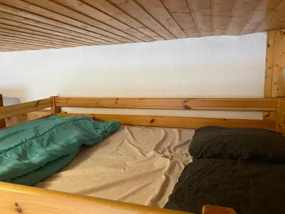 Un ou plusieurs lits dans un hébergement de l'établissement Résidence Le Chitelet